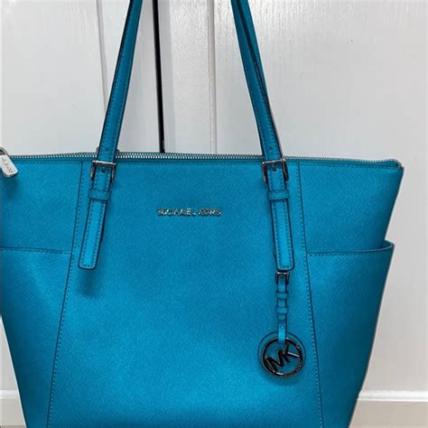 michael kors teal purse.